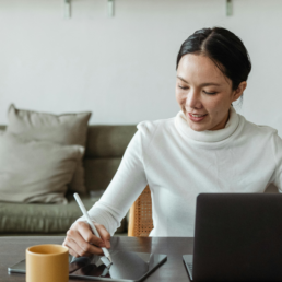 Ruder Finn Atteline - Albert Pagunsan Blog featured an woman writing on a tablet